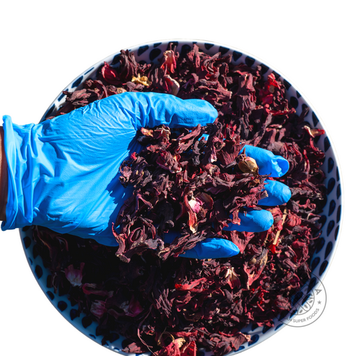 Vibrant dried hibiscus flowers in a jar, bowl or cup.